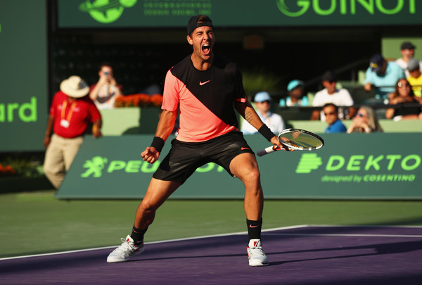 Kokkinakis celebrates his stunning win over Federer. Photo: Clive Brunskill/Getty Images