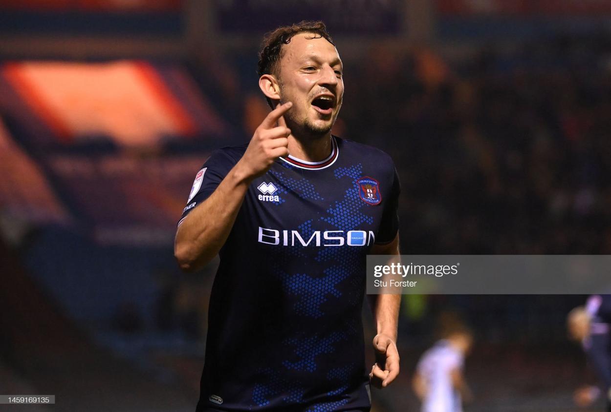 Kristian Dennis in action for <strong><a  data-cke-saved-href='https://www.vavel.com/en/football/2022/08/06/1119099-sky-bet-league-two-round-up-barrow-doncaster-and-stevenage-snatch-late-victories-gameweek-2-2022.html' href='https://www.vavel.com/en/football/2022/08/06/1119099-sky-bet-league-two-round-up-barrow-doncaster-and-stevenage-snatch-late-victories-gameweek-2-2022.html'>Carlisle United</a></strong>. (Photo by Stu Forster/Getty Images)