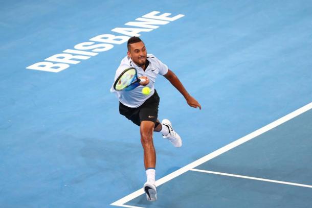 Nick Kyrgios chases down a forehand during his second round win. Photo: Brisbane International