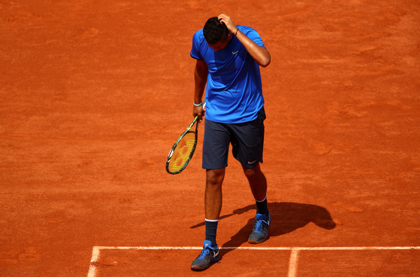 Kyrgios walks off the court disappointed during his third round loss at the French Open. Photo: Clive Brunskill/Getty Images