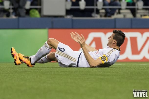 Sebastian Le Toux falls to the ground after scoring a goal against the Seattle Sounders | Brandon Farris - VAVEL USA