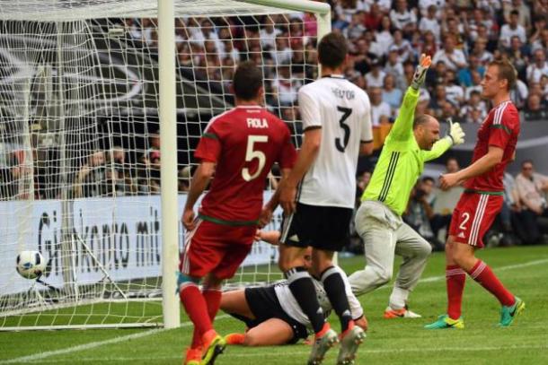 Lang looks on after own goal against Germany.