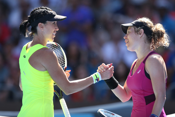 Jelena Jankovic and Laura Siegemund embrace each other at the net after their second round at the Australian Open in January. Photo credit : Michael Dodge / Getty Images.