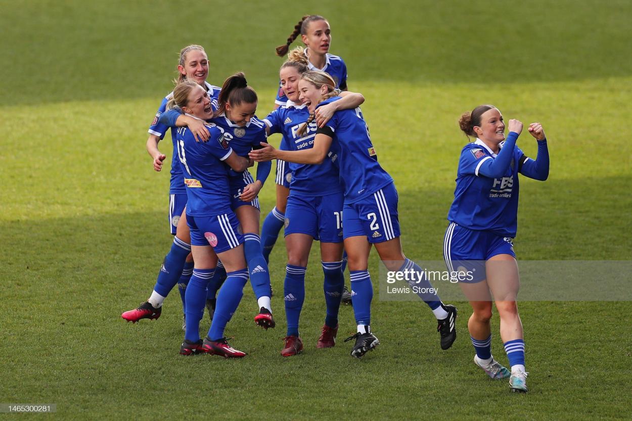 Hannah Cain of <b><a  data-cke-saved-href='https://www.vavel.com/en/data/leicester-city' href='https://www.vavel.com/en/data/leicester-city'>Leicester City</a></b> celebrates with teammates after scoring the team's first goal during the FA Women's Super League match between Liverpool and <b><a  data-cke-saved-href='https://www.vavel.com/en/data/leicester-city' href='https://www.vavel.com/en/data/leicester-city'>Leicester City</a></b> at Prenton Park on February 12, 2023 in Birkenhead, England. (Photo by Lewis Storey/Getty Images)