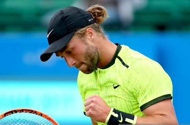 Photo: Jordan Mansfield/Getty Images-Liam Broady excited at securing the second set.