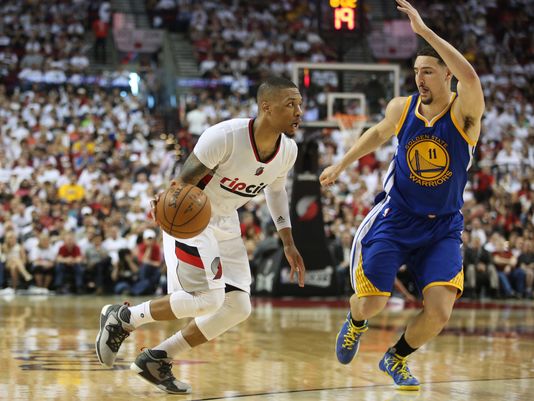 Portland Trail Blazers guard Damian Lillard (0) dribbles past Golden State Warriors guard Klay Thompson (11) in Game 3. (Photo: Jaime Valdez-USA TODAY)