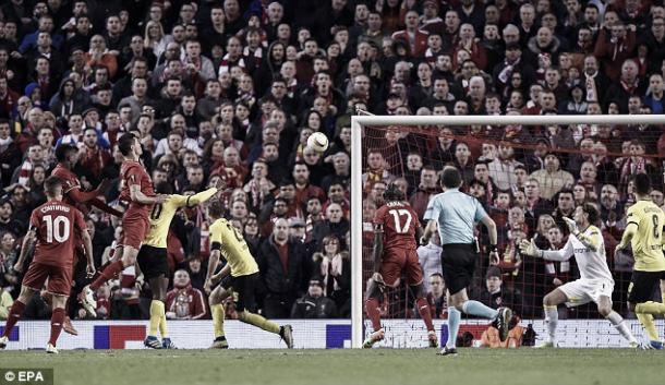 Above; Dejan Lovren scores a late winner in Liverpool's 4-3 victory over Borussia Dortmund | EPA