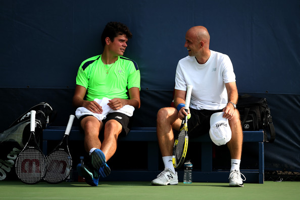 Ivan Ljubicic (right) talks to Milos Raonic during a practice in 2013. Photo: Clive Brunskill/Getty Images