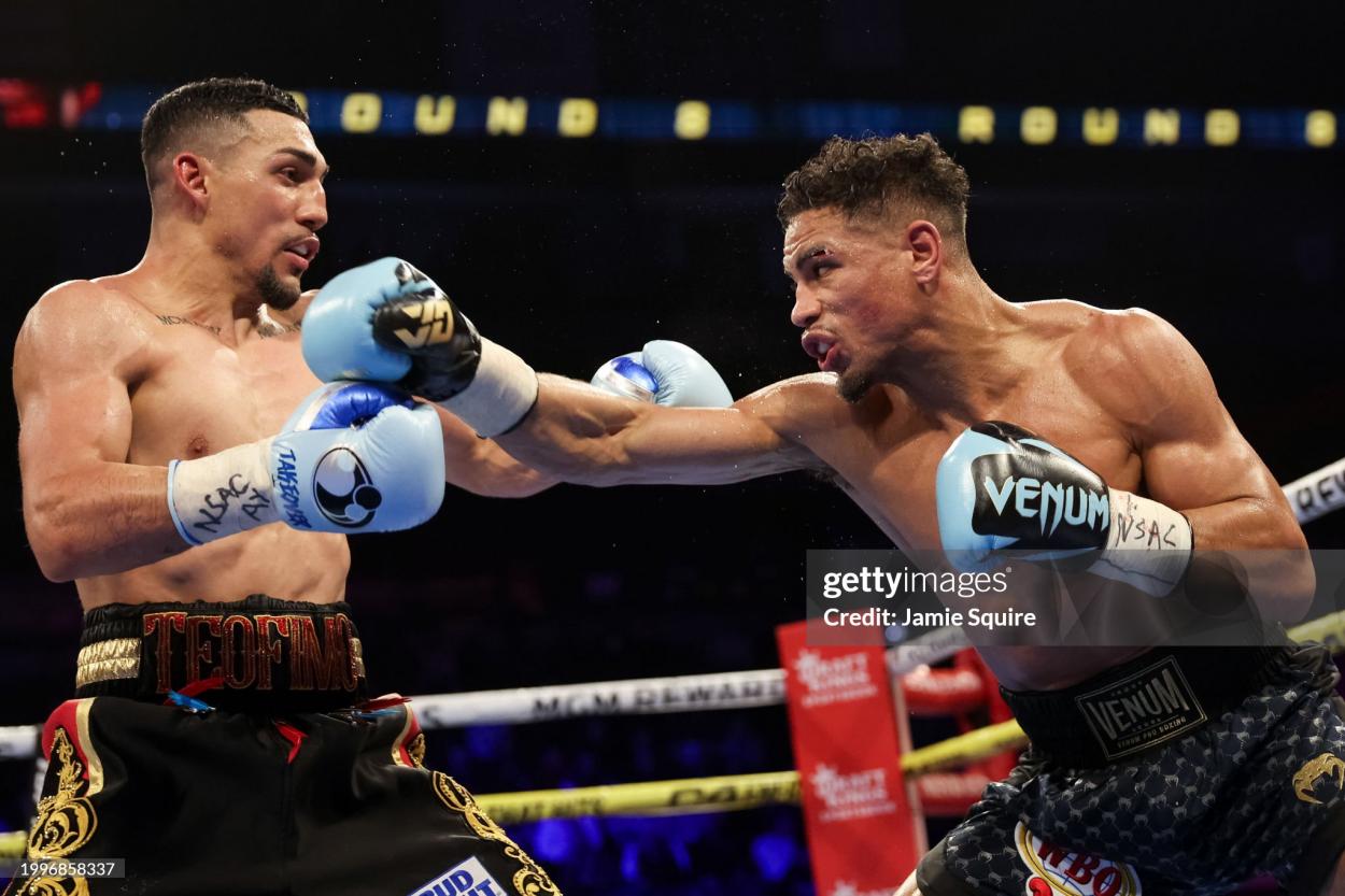LAS VEGAS, NEVADA - FEBRUARY 08: Teofimo Lopez exchanges punches with Jamaine Ortiz for the WBO junior welterweight title at Michelob ULTRA Arena on February 08, 2024 in Las Vegas, Nevada. (Photo by Jamie Squire/Getty Images)