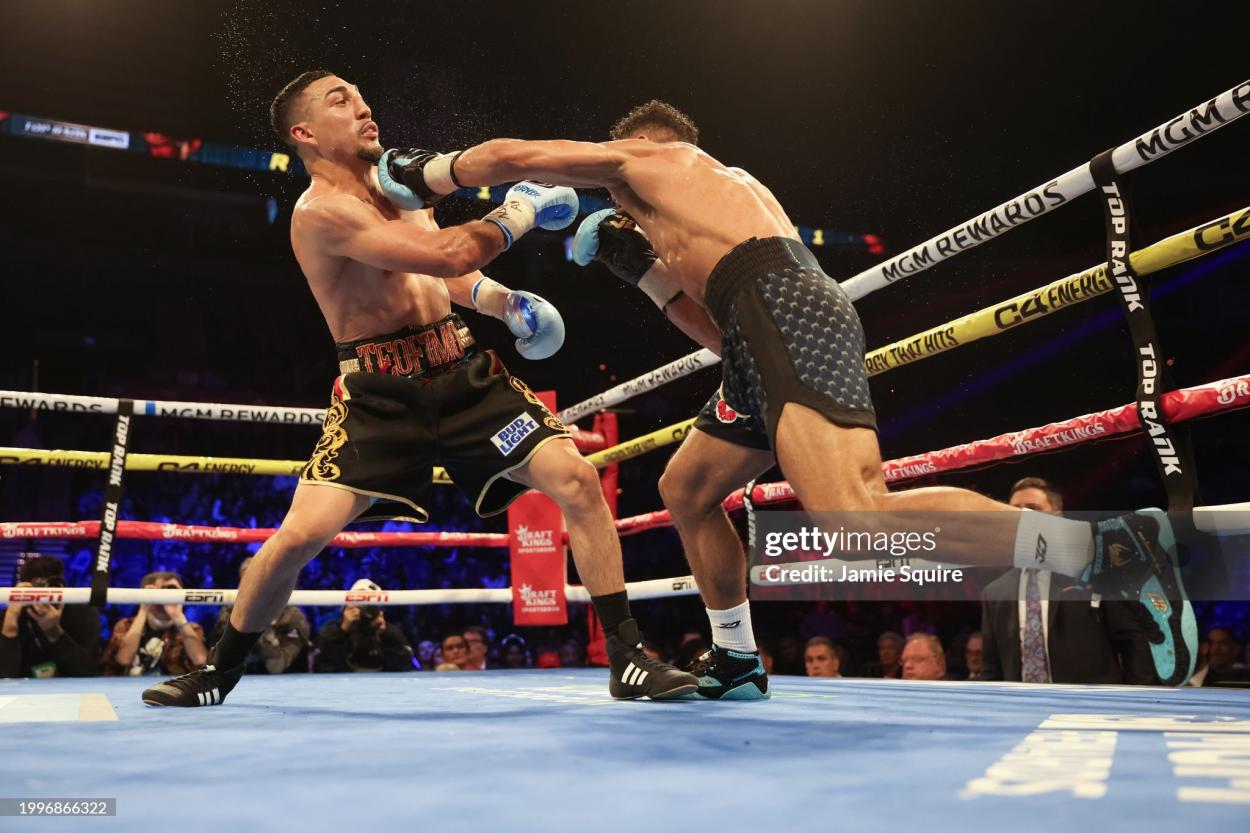 LAS VEGAS, NEVADA - FEBRUARY 08: Teofimo Lopez exchanges punches with Jamaine Ortiz for the WBO junior welterweight title at Michelob ULTRA Arena on February 08, 2024 in Las Vegas, Nevada. (Photo by Jamie Squire/Getty Images)