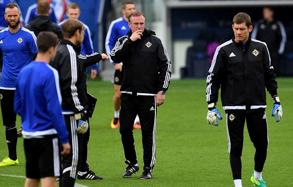 Michael O'Neill was pensive during today's final training session. | Image credit: PATRIK STOLLARZ/AFP/Getty Images