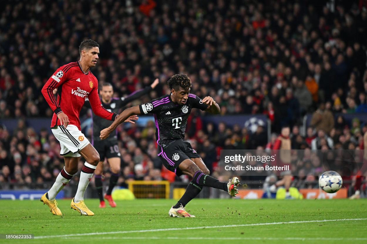 Kingsley Coman of Bayern Munich scores their team's first goal during the UEFA Champions League match between Manchester United and FC Bayern München at Old Trafford on December 12, 2023 in Manchester, England. (Photo by Shaun Botterill/Getty Images)