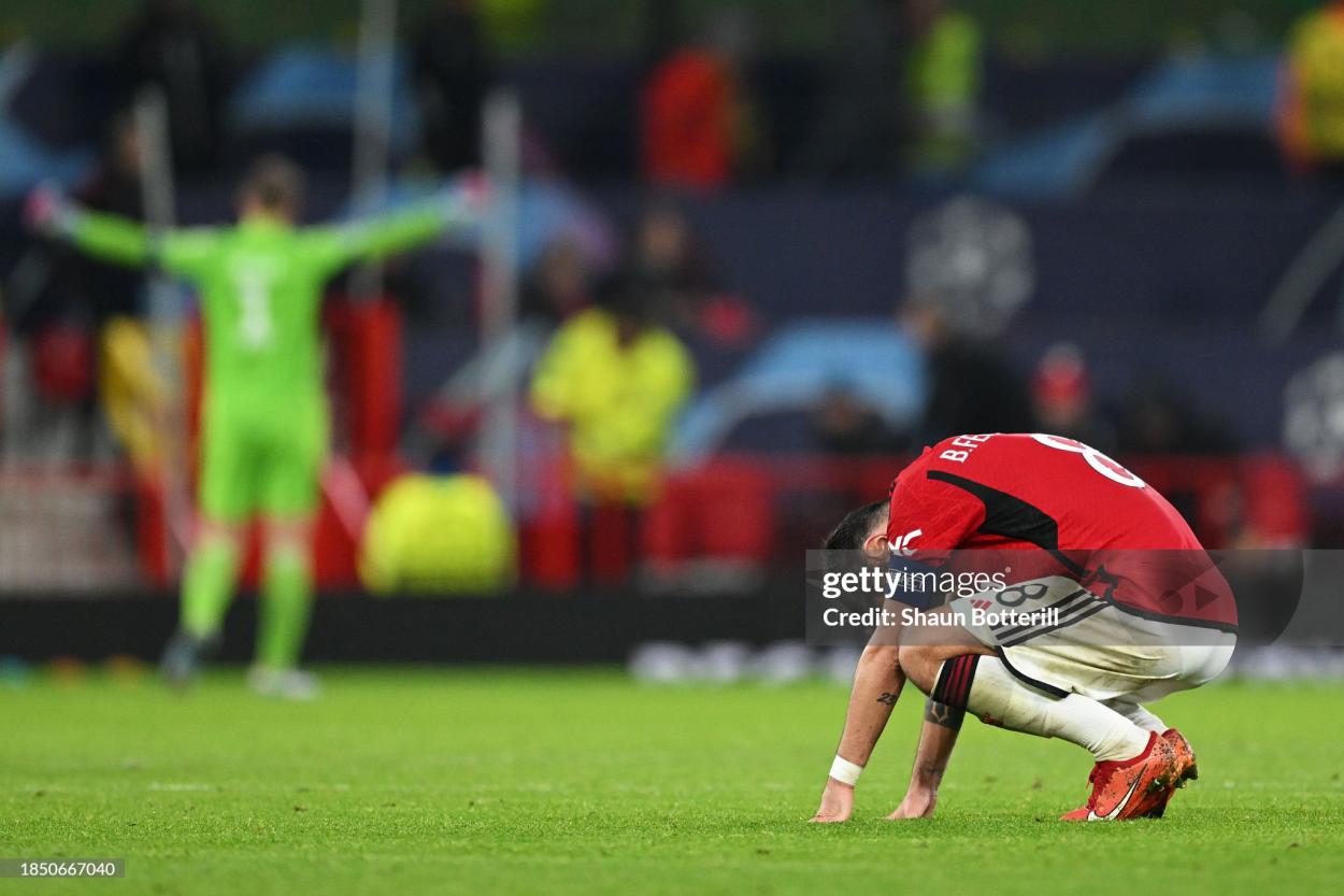 Bruno Fernandes of Manchester United looks dejected at full-time following the team's defeat in the UEFA Champions League match between Manchester United and FC Bayern München at Old Trafford on December 12, 2023 in Manchester, England. (Photo by Shaun Botterill/Getty Images)
