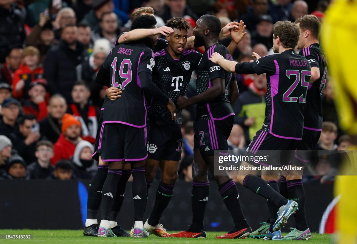 Kingsley Coman of Bayern Munich celebrates his goal with team mates during the UEFA Champions League match between Manchester United and FC Bayern Munchen at Old Trafford on December 12, 2023 in Manchester, England. (Photo by Richard Sellers/Sportsphoto/Allstar via Getty Images)