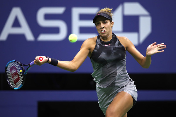 Madison Keys runs to hit a forehand | Photo: Matthew Stockman/Getty Images North America