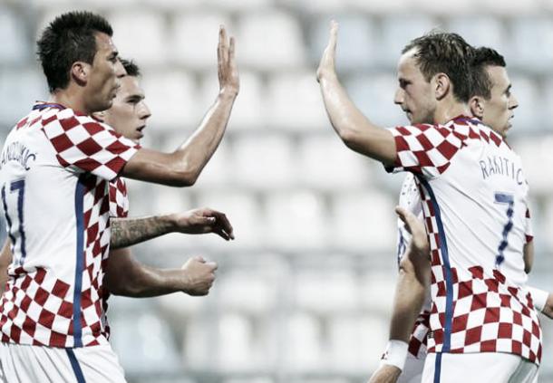 Above: Mario Mandzukic and Ivan Rakitic celebrating in Croatia's 10-0 win over San Marino | Photo: AFP / Getty Images