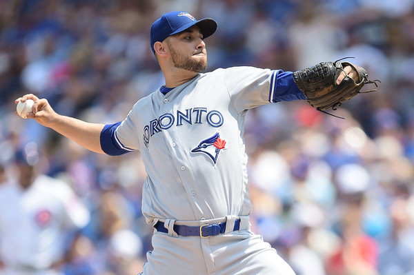 Sensing that the Blue Jays are on the verge of something special after a nightmarish 2017 campaign, Marco Estrada said he would be “very upset” if Toronto made the postseason next year and he wasn’t part of the roster. | Photo: Stacy Revere/Getty Images