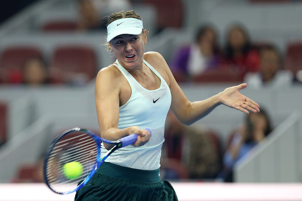 Maria Sharapova hits a forehand during her first-round win over Anastasija Sevastova at the 2017 China Open. | Photo: Emmanuel Wong/Getty Images