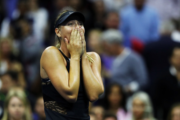 Maria Sharapova was in disbelief after her incredible win over Halep in the first round | Photo: Elsa/Getty Images North America