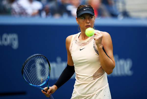 Maria Sharapova celebrates after winning a point during her second-round match against Timea Babos at the 2017 U.S. Open. | Photo: Clive Brunskill/Getty Images