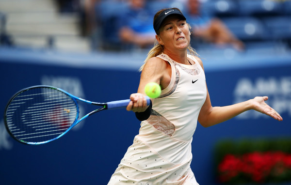 Maria Sharapova hits a forehand during her second-round match against Timea Babos at the 2017 U.S. Open. | Photo: Clive Brunskill/Getty Images