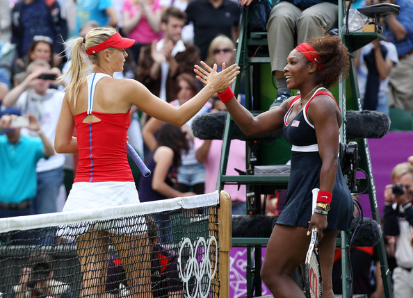Maria Sharapova and Serena Williams meet at the net after their Gold Medal match | Photo: PacificCoastNews.com