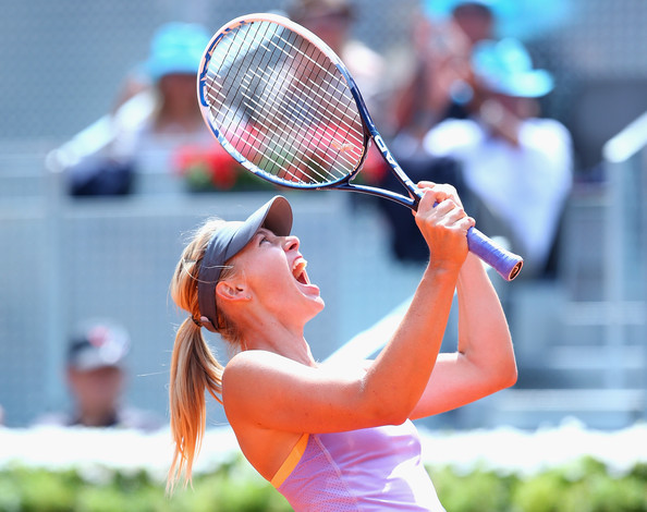 Maria Sharapova celebrates her win over Agnieszka Radwanska in 2014 | Photo: Julian Finney/Getty Images Europe