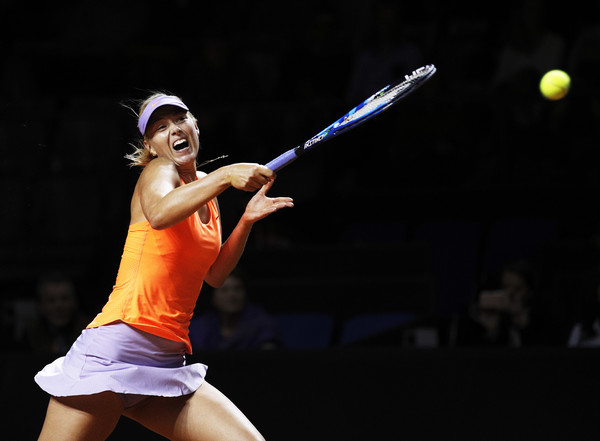 Maria Sharapova hits a forehand during her second round match against Ekaterina Makarova at the 2017 Porsche Tennis Grand Prix. | Photo: Adam Pretty/Bongarts