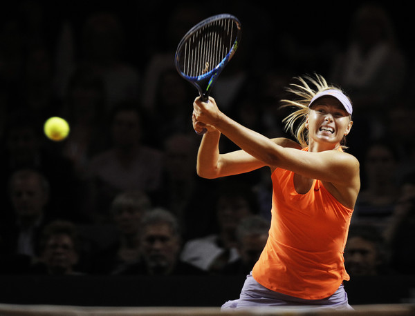 Maria Sharapova hits a backhand during her second-round match against Ekaterina Makarova at the 2017 Porsche Tennis Grand Prix. | Photo: Adam Pretty/Bongarts