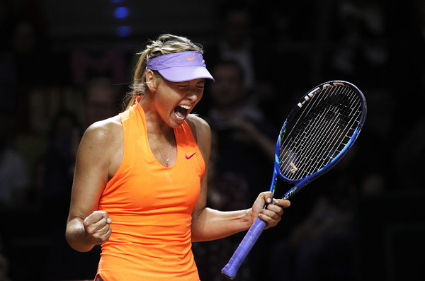 Maria Sharapova celebrates after defeating Roberta Vinci in her comeback match at the 2017 Porsche Tennis Grand Prix. | Photo: Adam Pretty/Bongarts