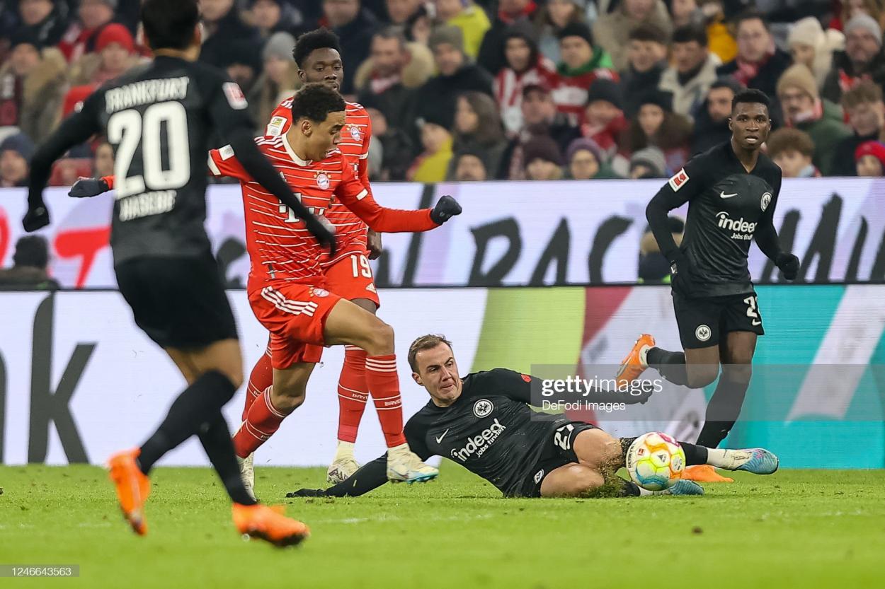 Mario Gotze tackles Jamal Musiala in Frankfurt's 1-1 draw with Bayern PHOTO CREDIT: DeFodi Images