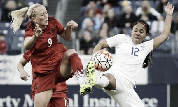 Islacker battles with Alex Scott at the SheBelieves Cup | Credit: Mark Humphrey