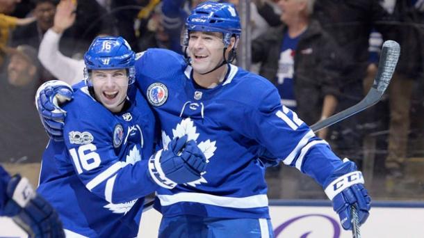 Marleau (right) celebrates his overtime-winning goal over Boston in November with Mitch Marner. Photo: Nathan Denette/The Canadian Press
