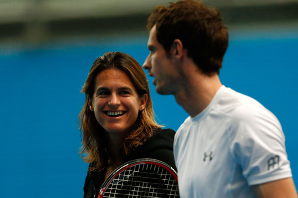 Amelie Mauresmo (left) speaks to Andy Murray during a practice at the Australian Open. Photo: Zak Kaczmarek/Getty Images