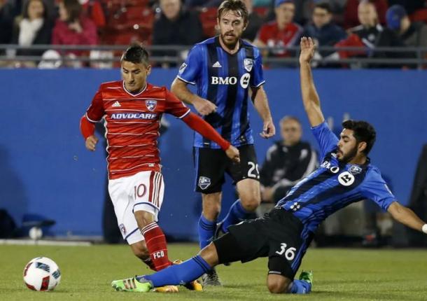 Mauro Diaz (in red, left). Photo credit: Jae S. Lee/Dallas Morning News 