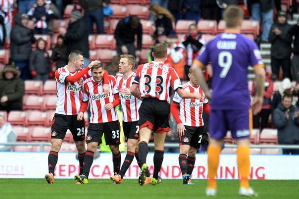 Charis Mavrias is mobbed by teammates after scoring his only goal in Sunderland colours - one which took the club into the quarter-finals of the FA Cup. (Photo: Owen Humphreys/PA)