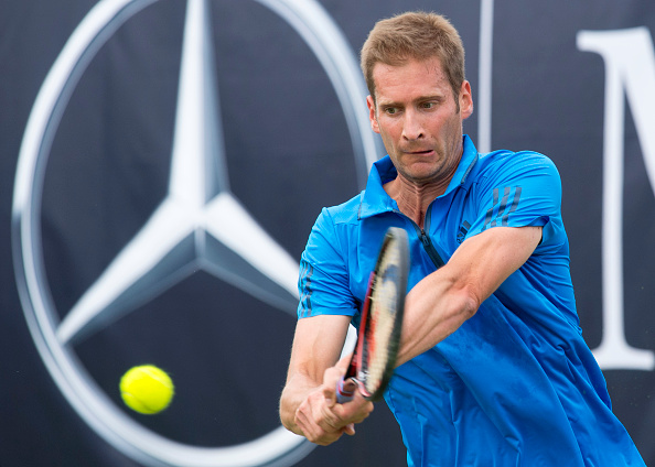 Florian Mayer plays a backhand during his second round win. Photo: Thomas Kienzle/AFP/Getty Images