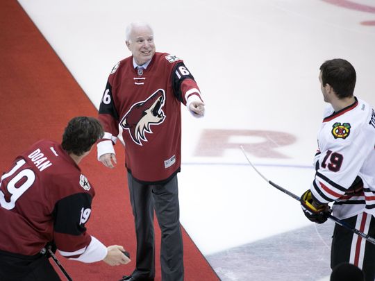 John McCain jokes with Jonathan Towes and Shane Doan while doing a puck drop. | Photo: (Photo: David Wallace/azcentral sports)