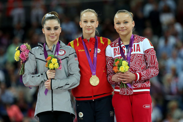 Sandra Izbasa, McKayla Maroney, and Maria Paseka on the podium after the Women's Vault Final at the London 2012 Olympic Games/Getty Images