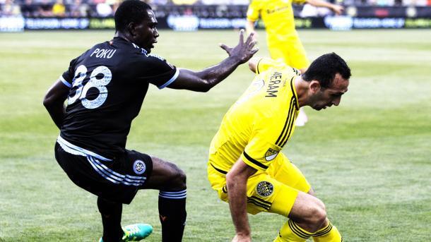 Justin Meram and former NYCFC player Kwadwo Poku battle for possession. | Photo: Major League Soccer