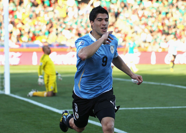 Luis Suarez celebrates scoring against Mexico in the 2010 World Cup,  expected to be the difference in this tournament he was announced as unfit to play 