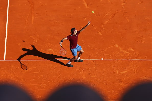 Federer serves as he tries to save a break point at the 2016 Monte-Carlo Rolex Masters. Credit: Michael Steele/Getty Images