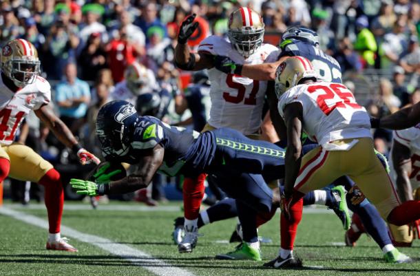 Christine Michael dives into the end zone for his second touchdown of the day against the San Francisco 49ers during week three | Source: Ted S. Warren - AP Photo