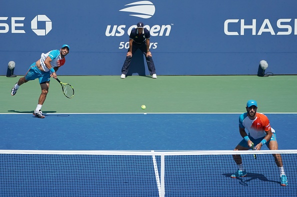 Juan Sebastian Cabal and Robert Farah serve up a win to reach the quarterfinals (Photo: Kena Betancur/Getty Images)