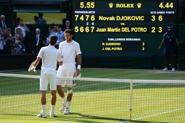 Del Potro and Djokovic meet at the net after their gruelling semifinal at Wimbledon in 2013 (Getty/Mike Hewitt)