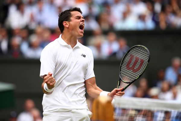 Milos Raonic celebrates after winning a point during his semifinal match against Roger Federer at the 2016 Wimbledon Championships. | Photo: Clive Brunskill/Getty Images Europe