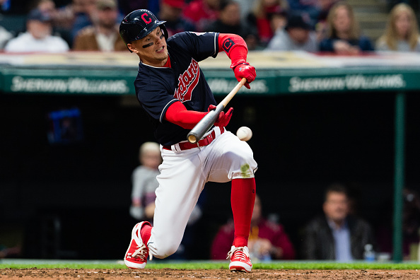 Guyer drops down a sacrifice bunt in the fifth inning. (Jason Miller/Getty Images)