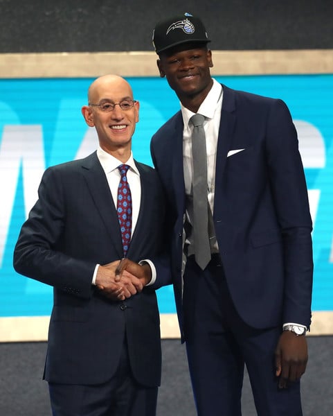 Mohamed Bamba poses with NBA Commissioner Adam Silver |Mike Stobe/Getty Images North America|