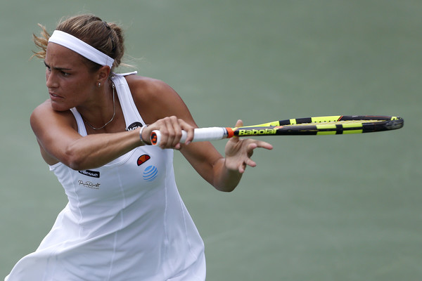 Puig quickly fell behind, losing the first two games, but she won six of the next seven to capture the opening set/Photo: Clive Brunskill/Getty Images