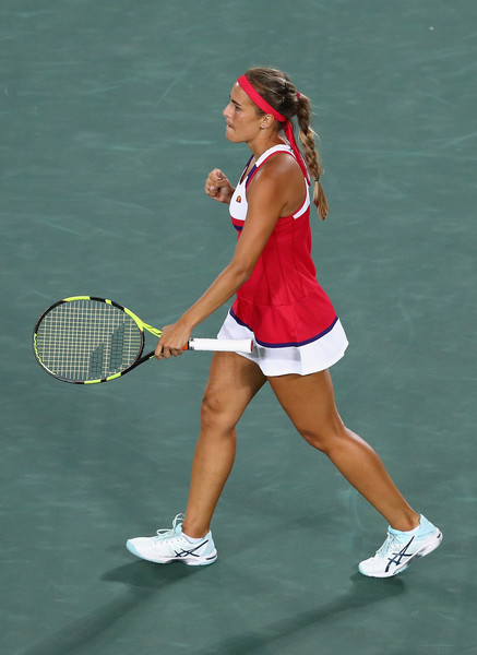 Monica Puig celebrates after winning a point during her women’s singles gold medal match against Angelique Kerber on Day 8 of the Rio 2016 Olympic Games. | Photo: Dean Mouhtaropoulos/Getty Images South America